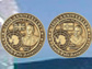 Photo of the back and front of the commemorative coin.