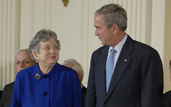 Fay Ajzenberg-Selove with President George W. Bush.