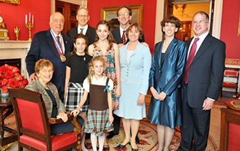 Berni Alder and his family at the White House