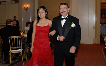 NMS Laureate Mostafa El-Sayed and a student at a gala