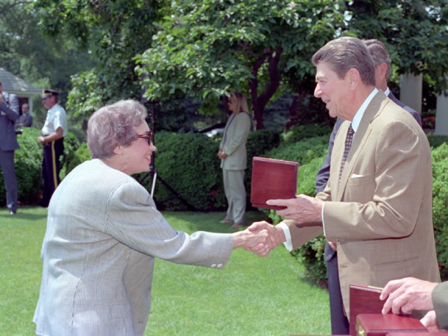 President Ronald Reagan shakes hands with Anne Anastasi