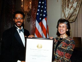 Photo of Erich D. Jarvis, 2002 Waterman award winner, with NSF Director Rita Colwell